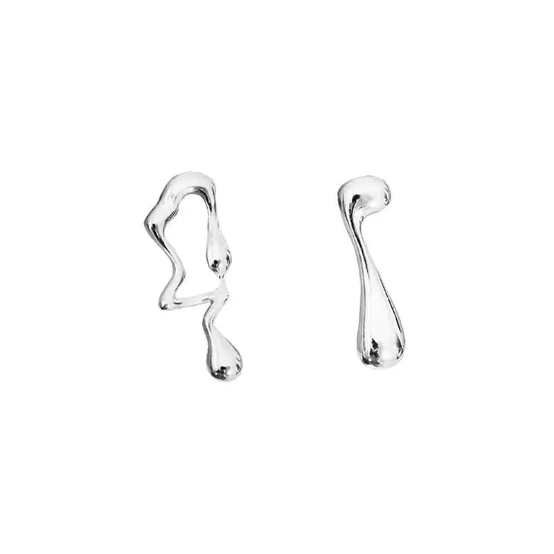 Asymmetrical liquid metal drop earrings, offering a unique and contemporary style.