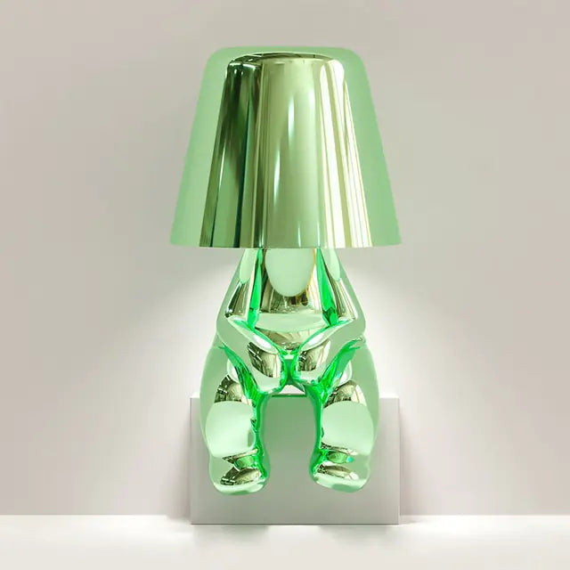 Lime green little man LED lamp, a creative and functional lighting accessory.