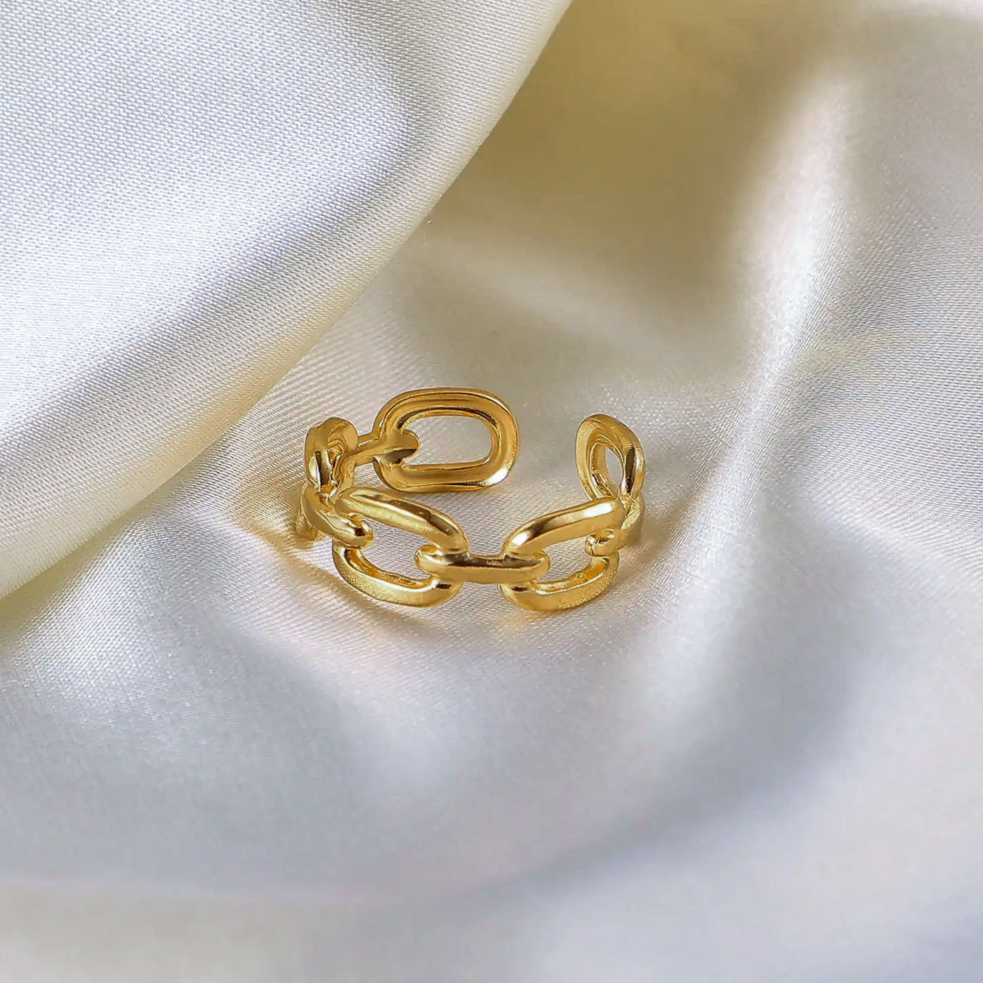 Gold plated link chain ring crafted from stainless steel, a luxurious and eye-catching piece of jewelry.