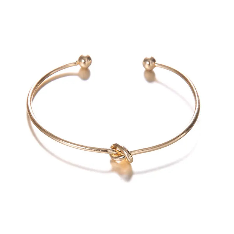 Single knot bracelet, showcasing a simple yet elegant design.