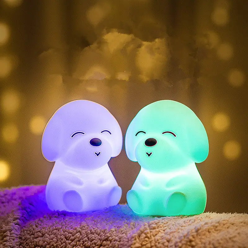 Night light in the shape of a puppy, emitting a soft and gentle glow.